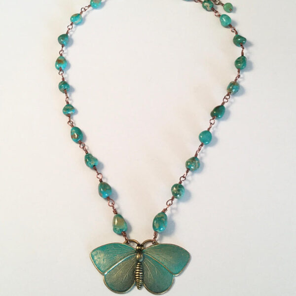 Necklace with brass butterfly