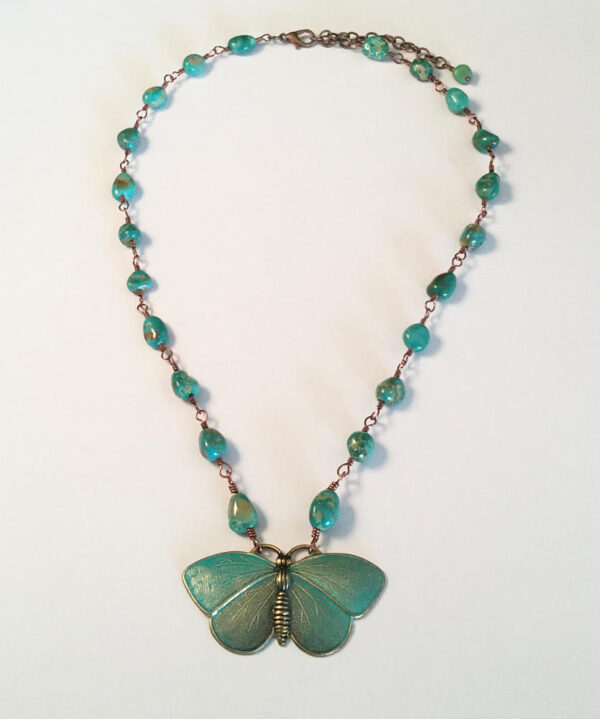 Necklace with brass butterfly