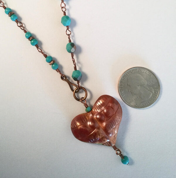 Close up of Copper Heart Dos necklace