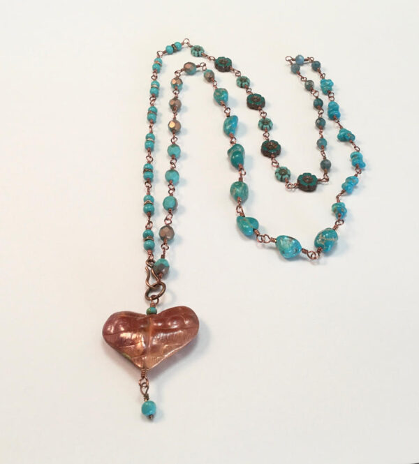 Necklace with puffed copper heart